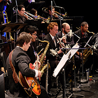 Several jazz musicians with instruments